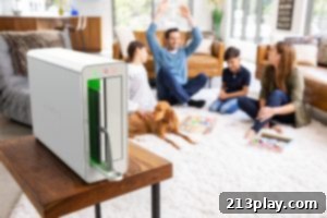 Tech Haven 2 TechDen device with a smartphone and tablet being placed inside, illustrating its use for screen time management.