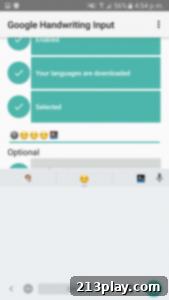 Google Handwriting Input in use, showing a user drawing an emoji and its digital recognition.